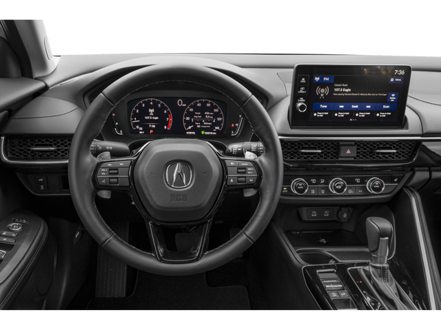 Acura ADX interior showing the center console with the storage compartment open between the front seats