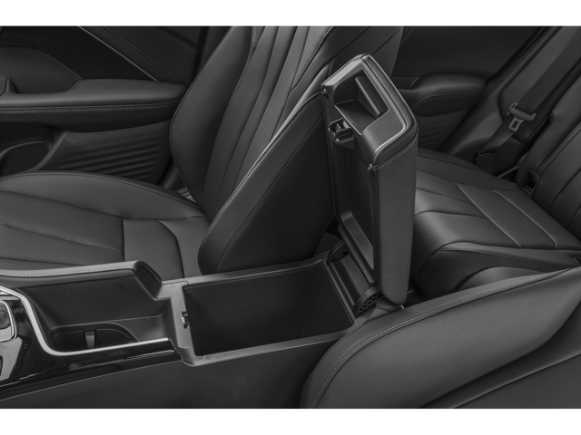 Rear cargo area of an Acura ADX with the liftgate open, showing the available luggage space behind the rear seats
