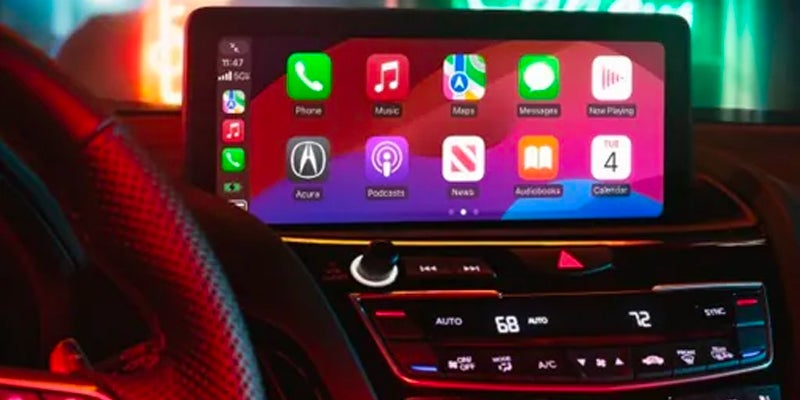 Acura infotainment system displaying smartphone integration features on the center touchscreen