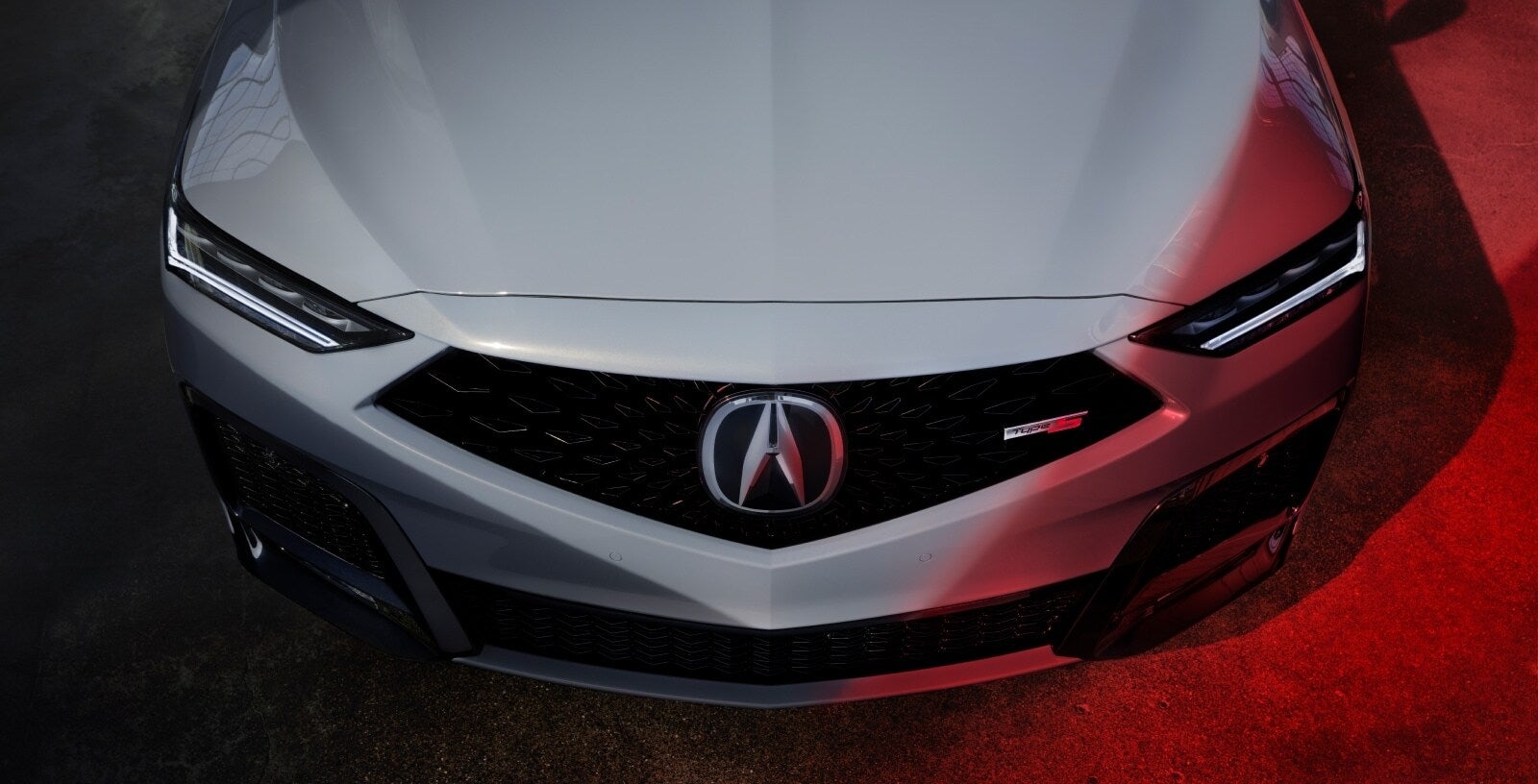 Cinematic shot of the 2026 Acura MDX from top view